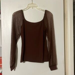 Dorose brown long sleeve top. Ribbed bodice w/mesh dotted sleeve.